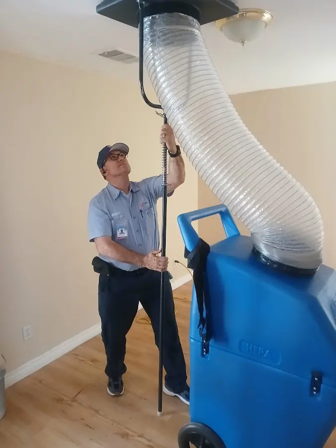 Mini Split Installation technician using HEPA equipment in Winona Lake